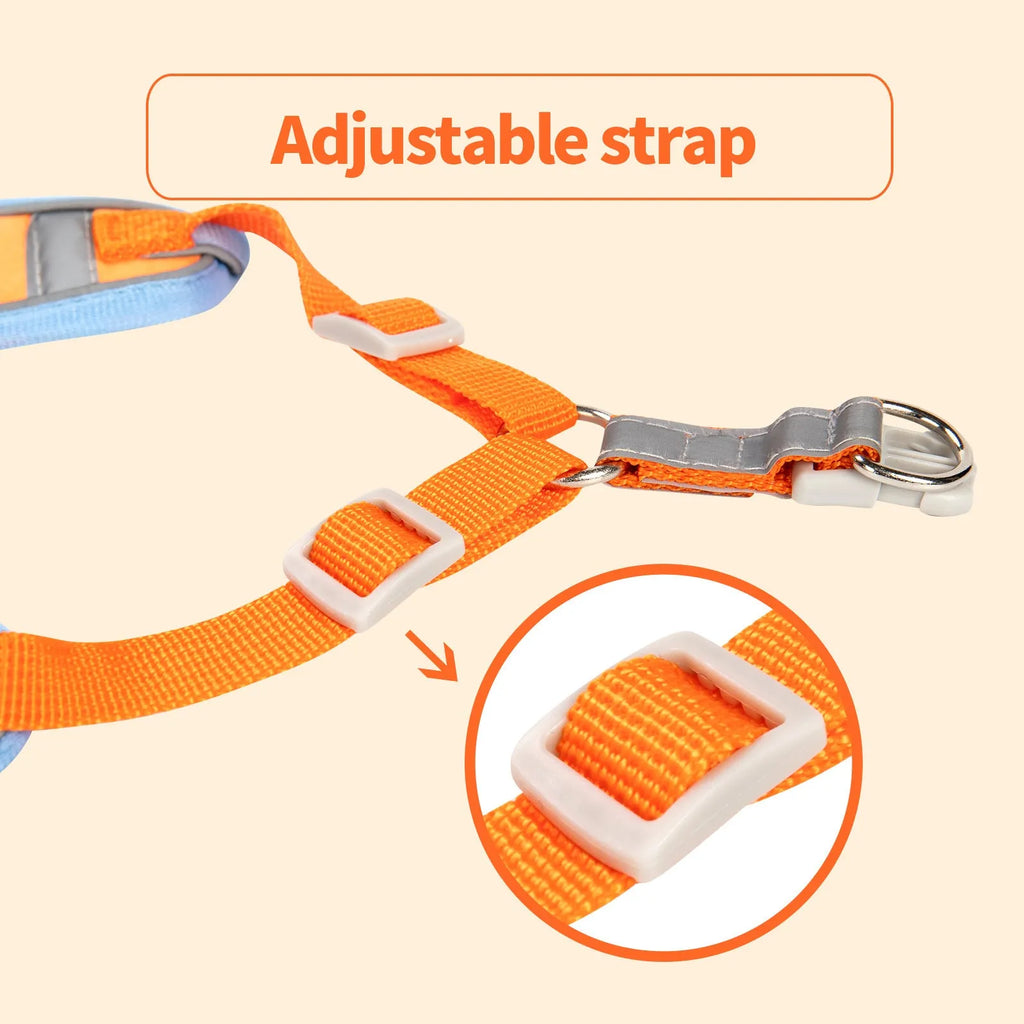 Purple adjustable dog vest harness with an attached haulage rope laid flat.
