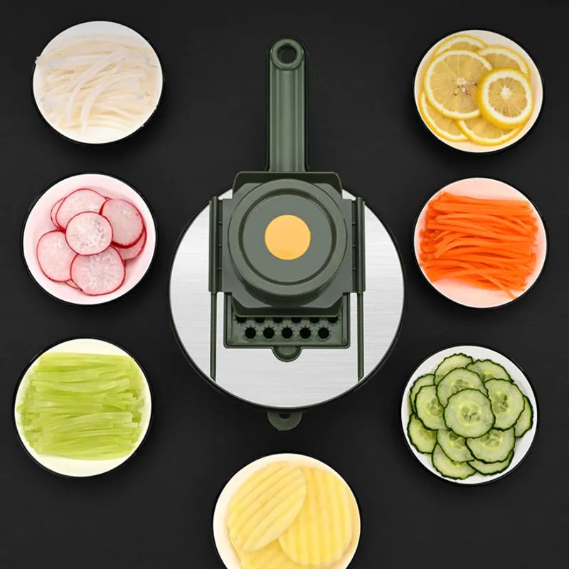 Household vegetable slicer with five stainless steel blades, gauntlet and paring knife in grey or green