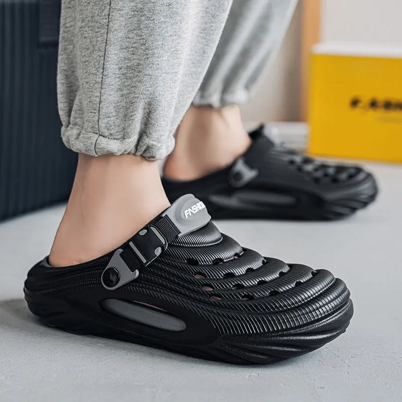 Men's solid colour EVA platform slippers with hollow-out design, shown in light green.
