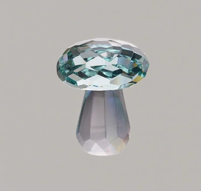 Colourful geometric crystal mushroom decoration in transparent, green, red, or yellow, 40mm by 53mm.