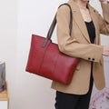 Women's genuine leather commuter shoulder bag in box-type shape with urban simplicity styling