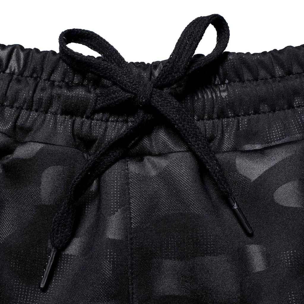 Men's camouflage printed jogging pants in cotton, loose fit, mid-waisted, available in five colours.