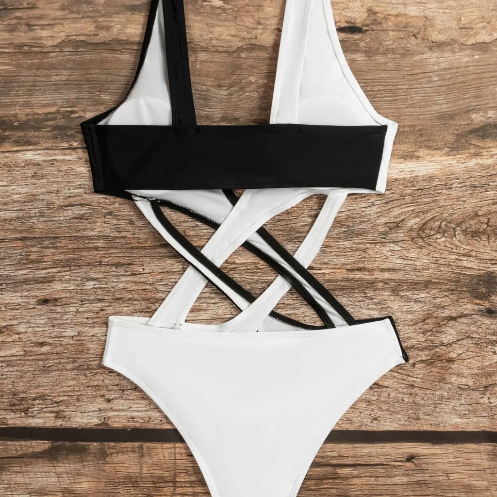 White women's one-piece swimsuit with hollow-out colour block design on nylon fabric