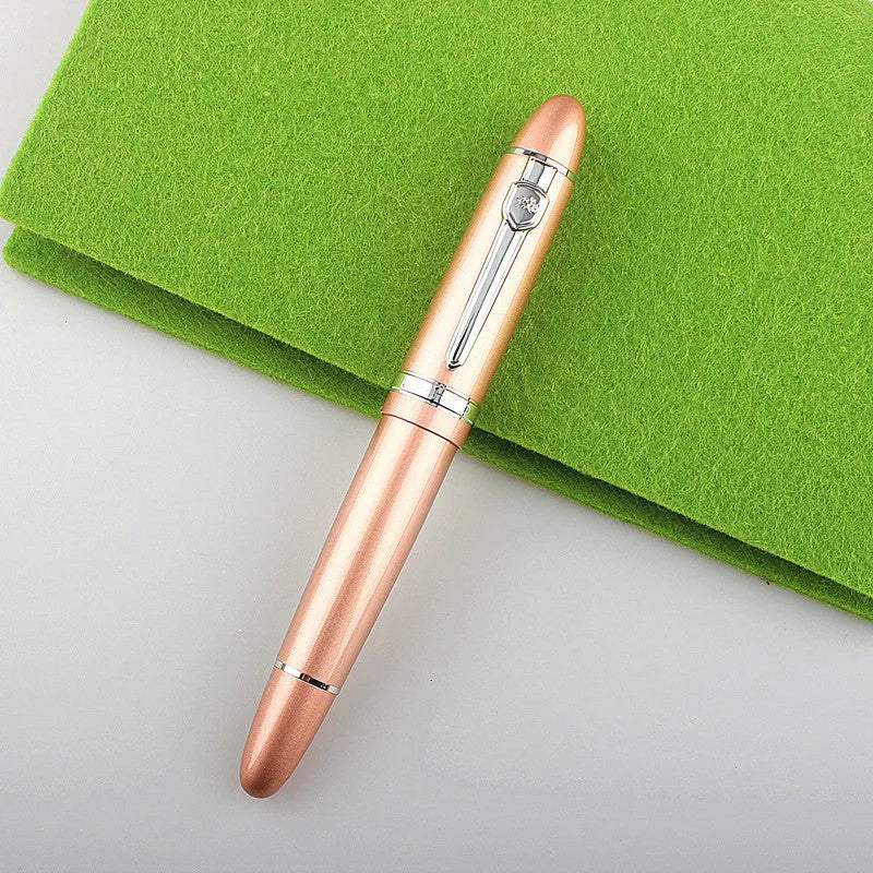 Metal ball pen with pearl round beads and black gold clip on white background