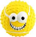 Green latex dog ball with a smiley face and squeaker for fetch games.