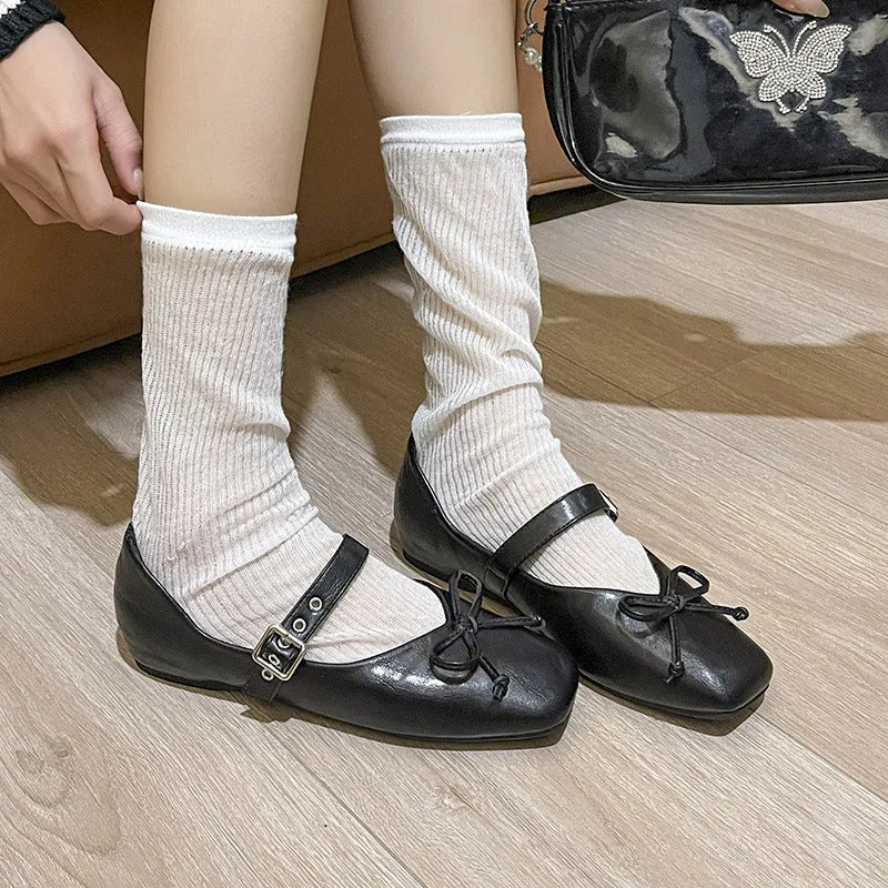 Mary Jane flat pumps in satin with rhinestone and tassel decoration, low heel, available in black beige and silver