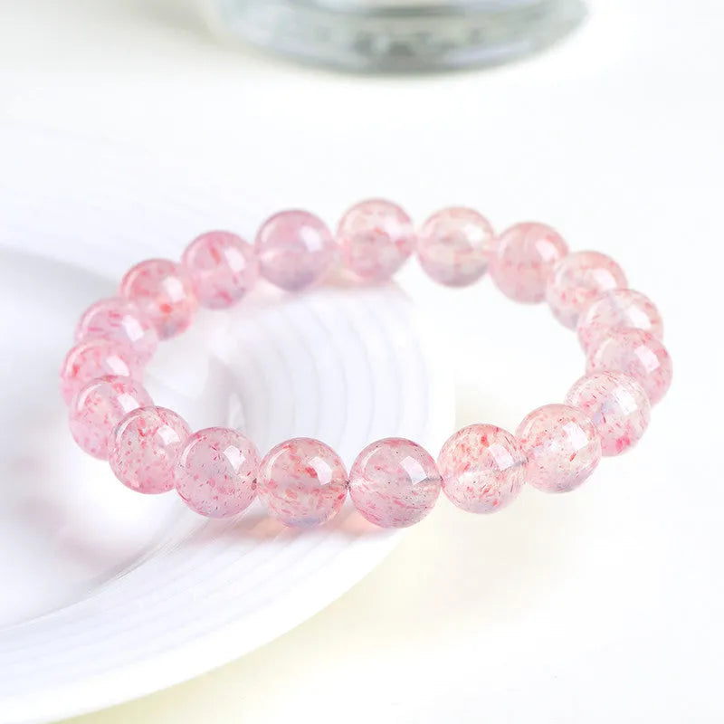 Natural white water strawberry quartz crystal bracelet with 10-10.8mm round beads.
