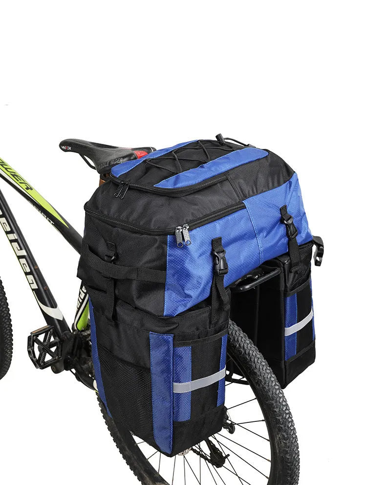 Rhinoceros large green bicycle rear pannier bag mounted on a bike rack for touring.
