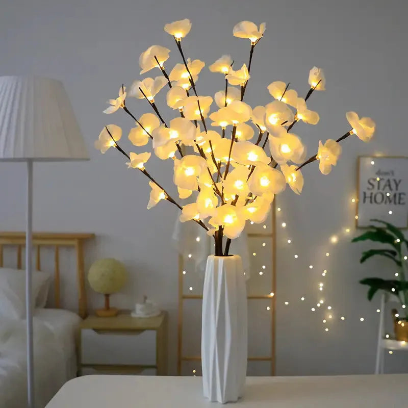 Pink phalaenopsis orchid branch LED light with fabric shade on a wooden surface, measuring 65cm long.