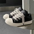Black men's slip-on casual shoes with leather upper and rubber sole showing round toe and flat heel