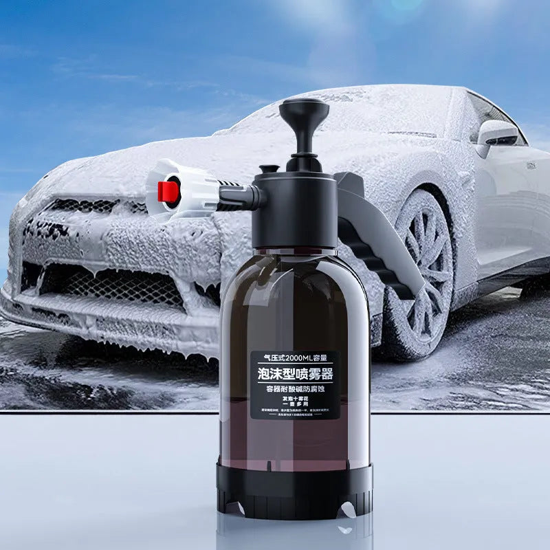 Black hand-held 2-litre foam sprayer with pump handle and two nozzles for car washing and gardening