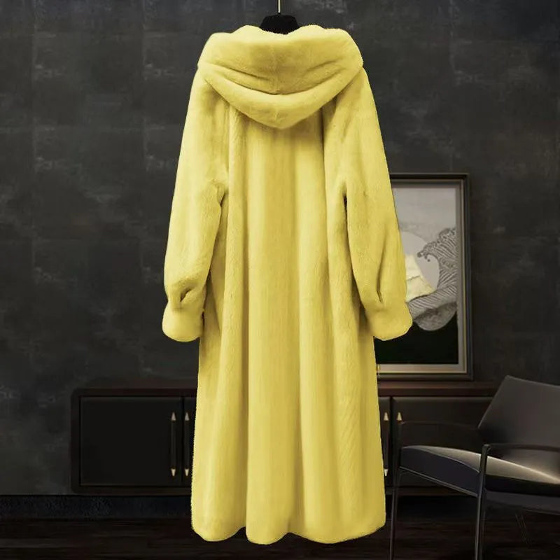 Long brown leopard print faux fur coat on a plus-size model, showing its 100cm length and loose fit.