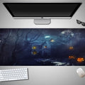 Oversized Halloween-themed mouse pad with non-slip rubber cloth base on a desk