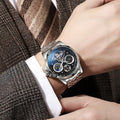 Automatic men's business watch with luminous hands on a steel bracelet.