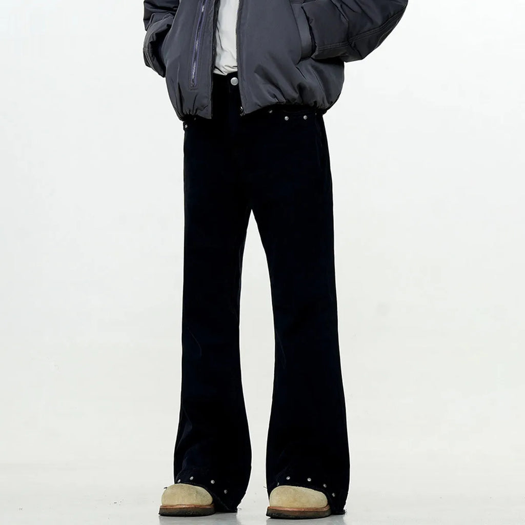 Black and grey green cotton retro skinny jeans with a straight leg and horn opening on a mid waist.