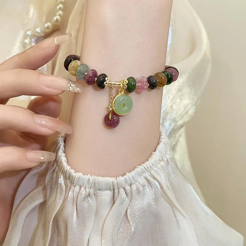 Handmade colourful tourmaline bracelet with rabbit pendant and round abacus beads