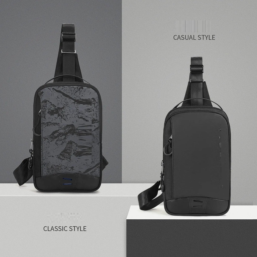 Casual black TPU camouflage chest bag with a single shoulder strap and soft handle, showing a square vertical shape and outer sandwich pocket.