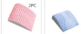 Blue back stretcher pillow for lumbar and neck support on a grey background.