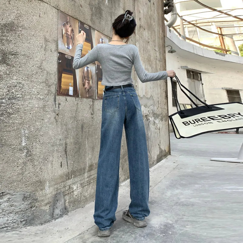 A pair of women's high-waist straight-leg jeans in a retro blue colour, shown in a cropped length.