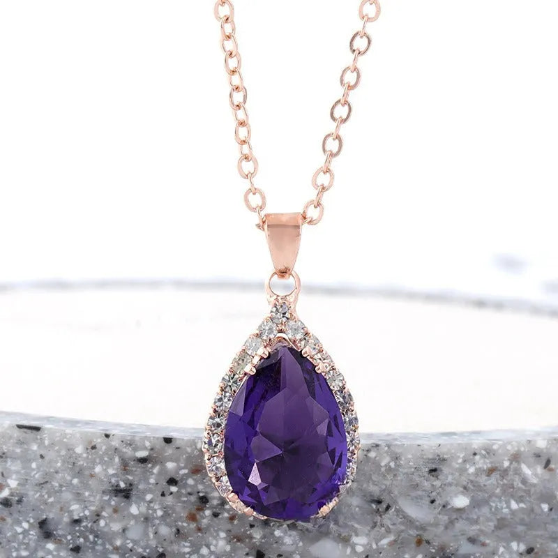 Women's rose gold geometric drop necklace with rhinestone inlay in pink colour