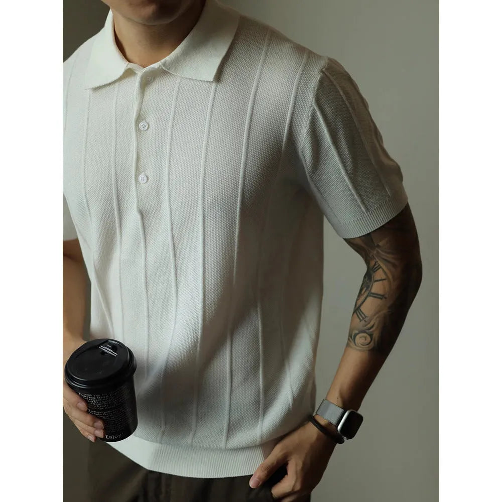 Men's solid colour loose fit polyester t-shirt on a hanger, shown in black and white.