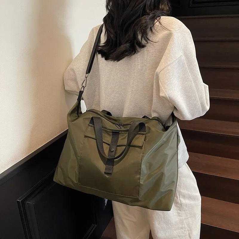 One-shoulder travel backpack in Oxford cloth with 36-55 litre capacity