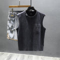 Men's solid black cotton sleeveless t-shirt with loose fit and straight hem on a white background.