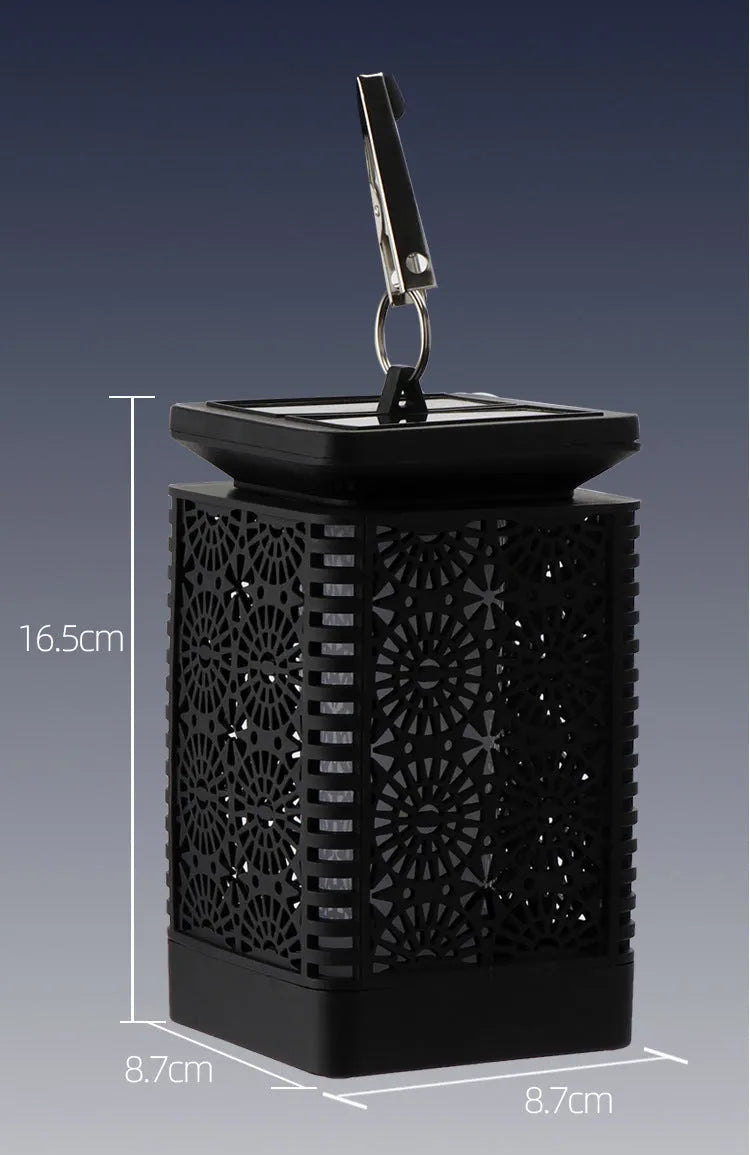 Solar-powered retro-style flame garden light with ground spike for outdoor patio use