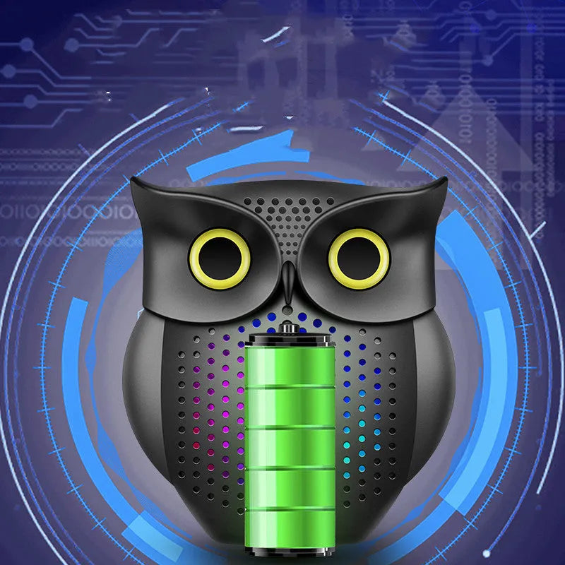 Black wireless Bluetooth speaker with a cartoon owl design on the front.