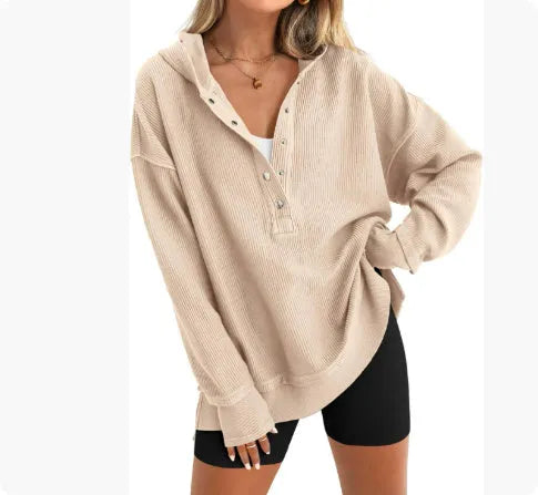 Women's solid colour loose-fit pullover sweater with raglan sleeves in peacock green.