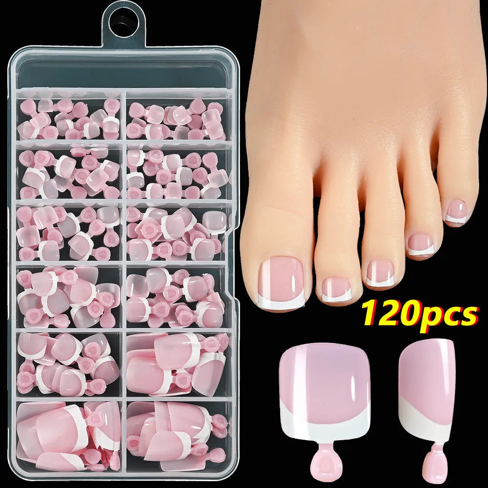 120 piece boxed set of full square short artificial toenails with French white edge design on nude base