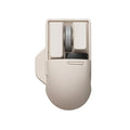 Tofu-coloured three-mode wireless mouse with ergonomic design on a desk.