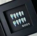 HAILANG blue plastic nail tip guards in four sizes XS, S, M, L for nail protection.