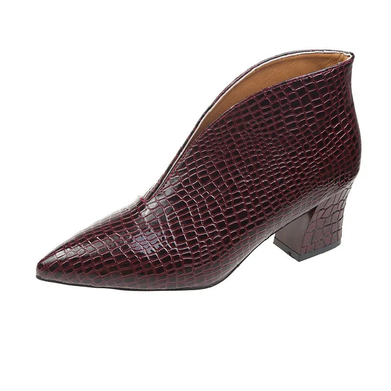 Women's black V cut pointed toe ankle boots with embossed detailing and chunky heel