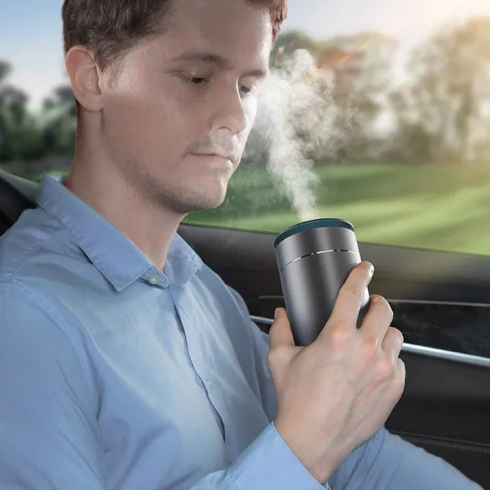 Mini car heavy fog aromatherapy humidifier in dark grey column shape with USB cable