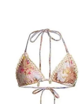 Women's creamy-white floral bikini set with matching skirt for beach holidays