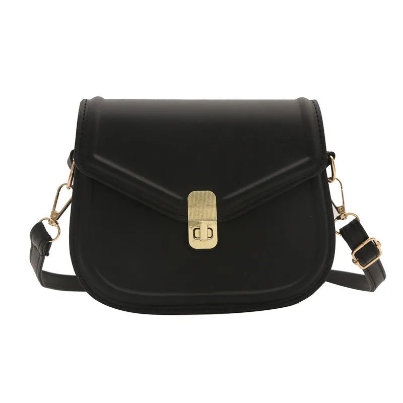 Soft PU clamshell messenger bag in horizontal square shape on a shoulder strap.