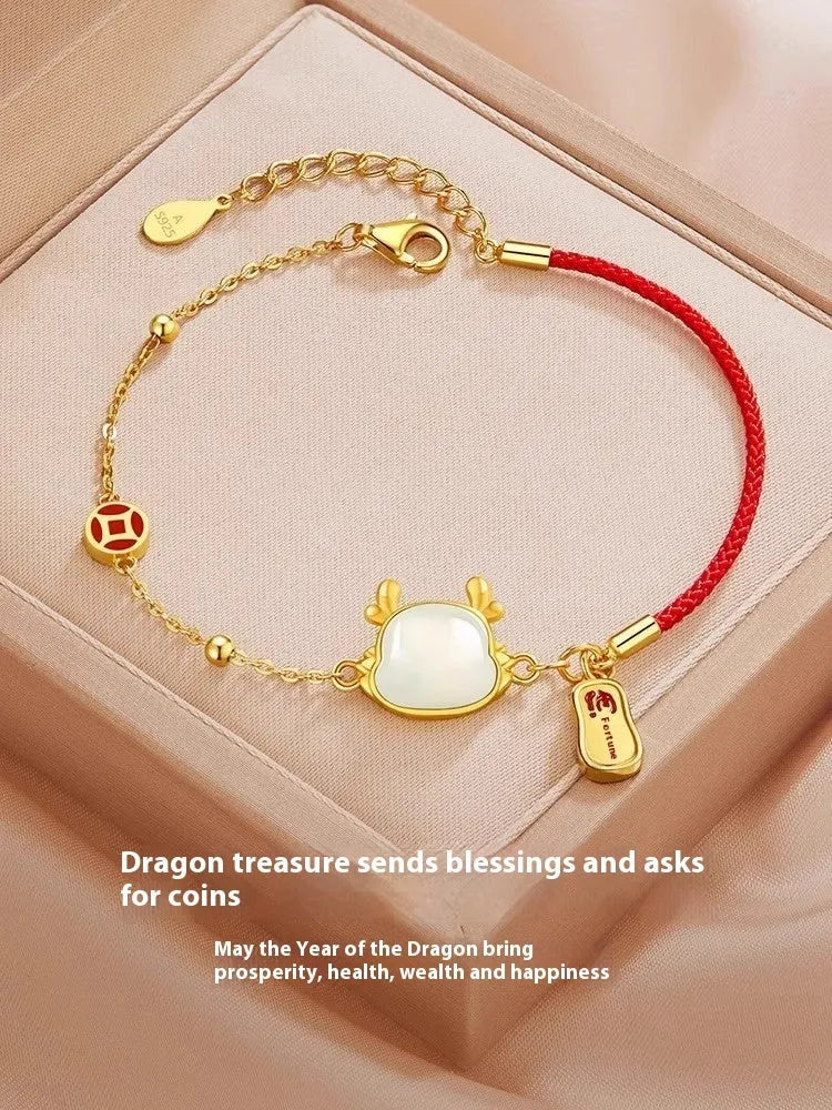 Silver-plated dragon zodiac bracelet with Hetian jade elements for women, showing electroplated finish and animal motif.