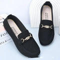 Gommino women's black slip-on casual shoes with a round toe and soft rubber sole on a neutral background.