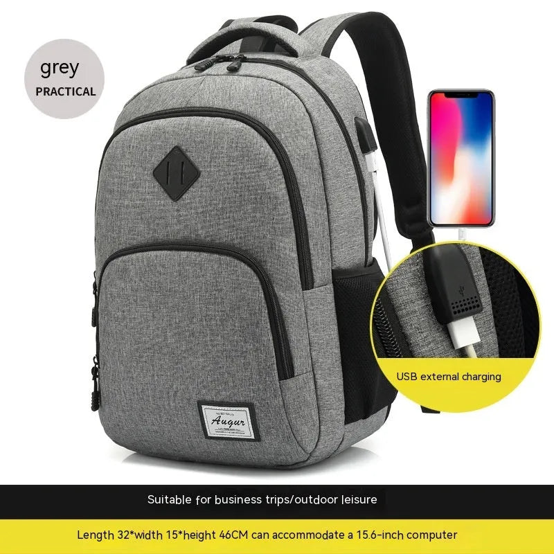 Simple grey and black nylon backpack with USB charging port on side strap.