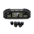 Solar tyre pressure monitor display unit with colour screen next to six external sensors for trucks.