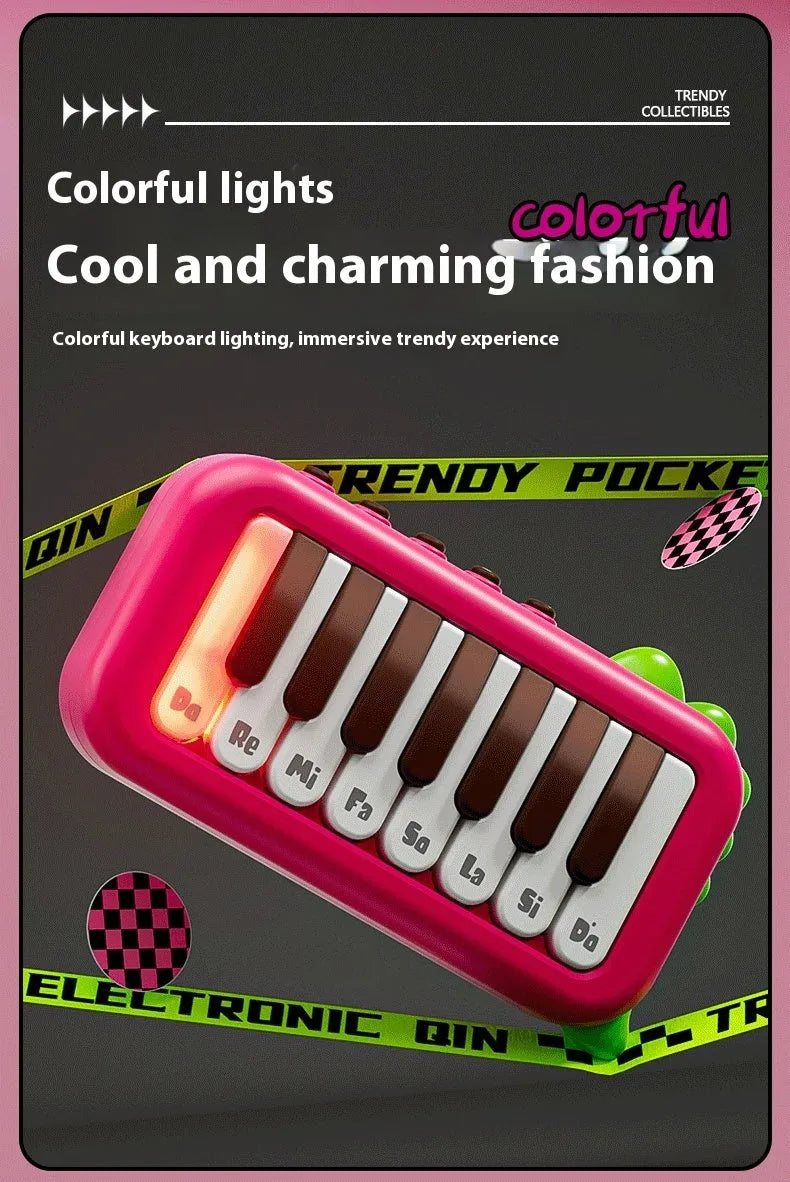 Baby pocket electronic keyboard toy in Little Piano Pattern design, shown in green and pink colour options.