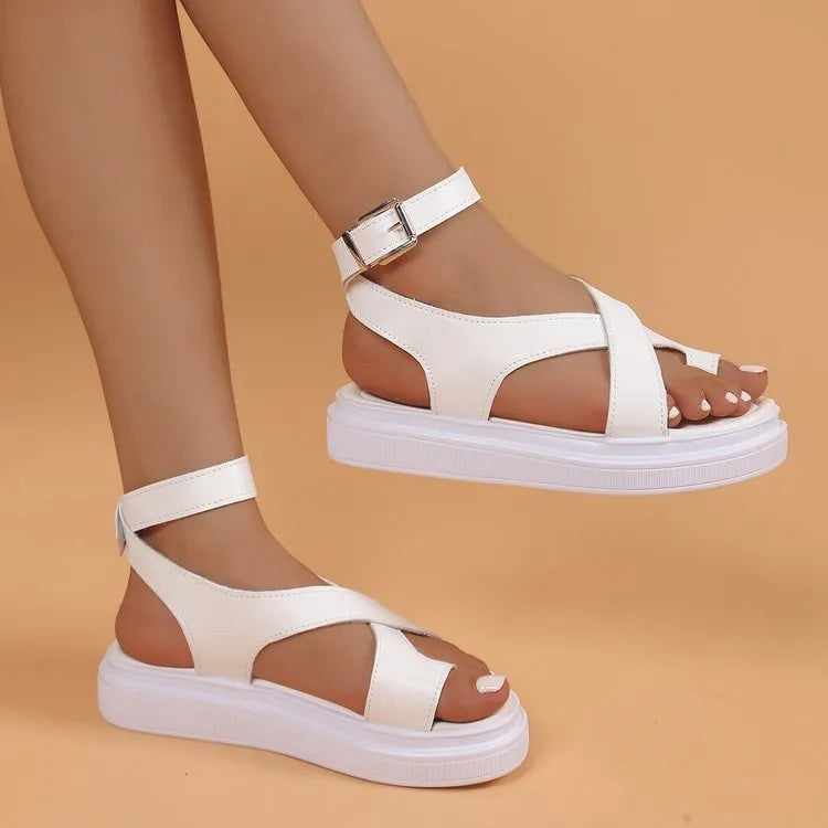 Women's white Roman-style buckle sandals with thick soles and lace loop-foot design