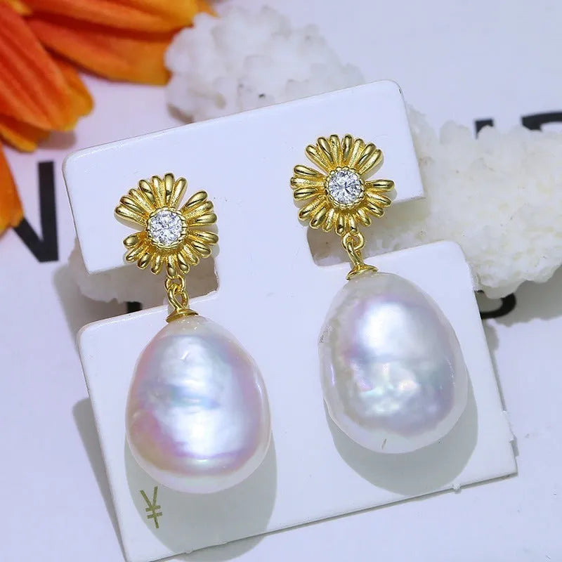 Baroque floral S925 sterling silver drop earrings with an open ring holder frame on the eardrop.