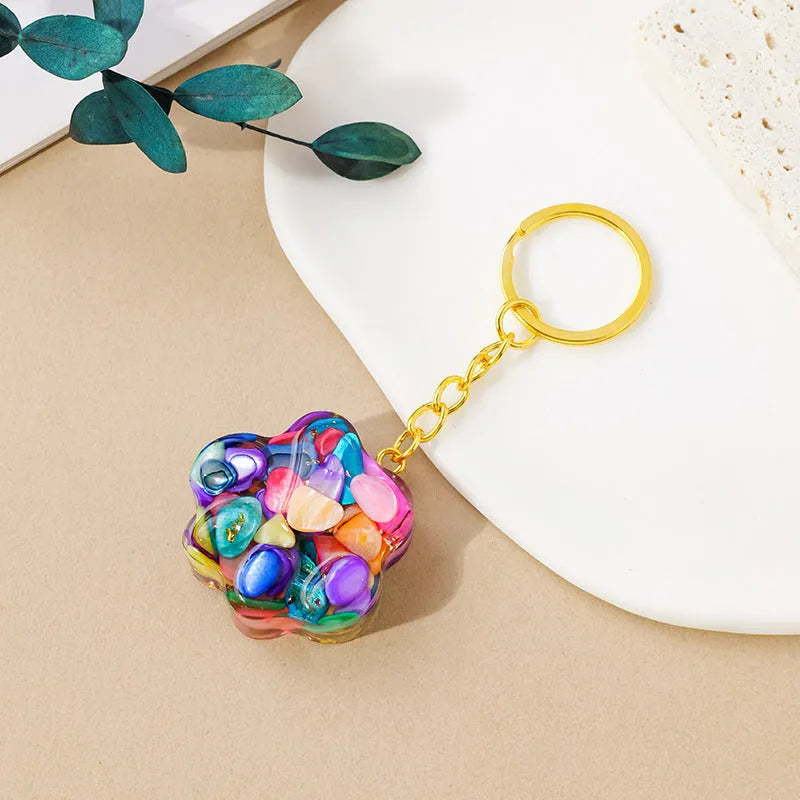 Handmade natural crystal cat's paw keychain pendant in choice of ten stones including pink crystal and turquoise.