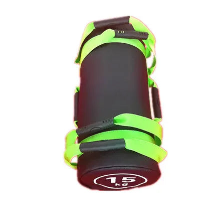 Flat white PVC fitness sandbag on gym floor, showing size and sturdy handles for weight training.