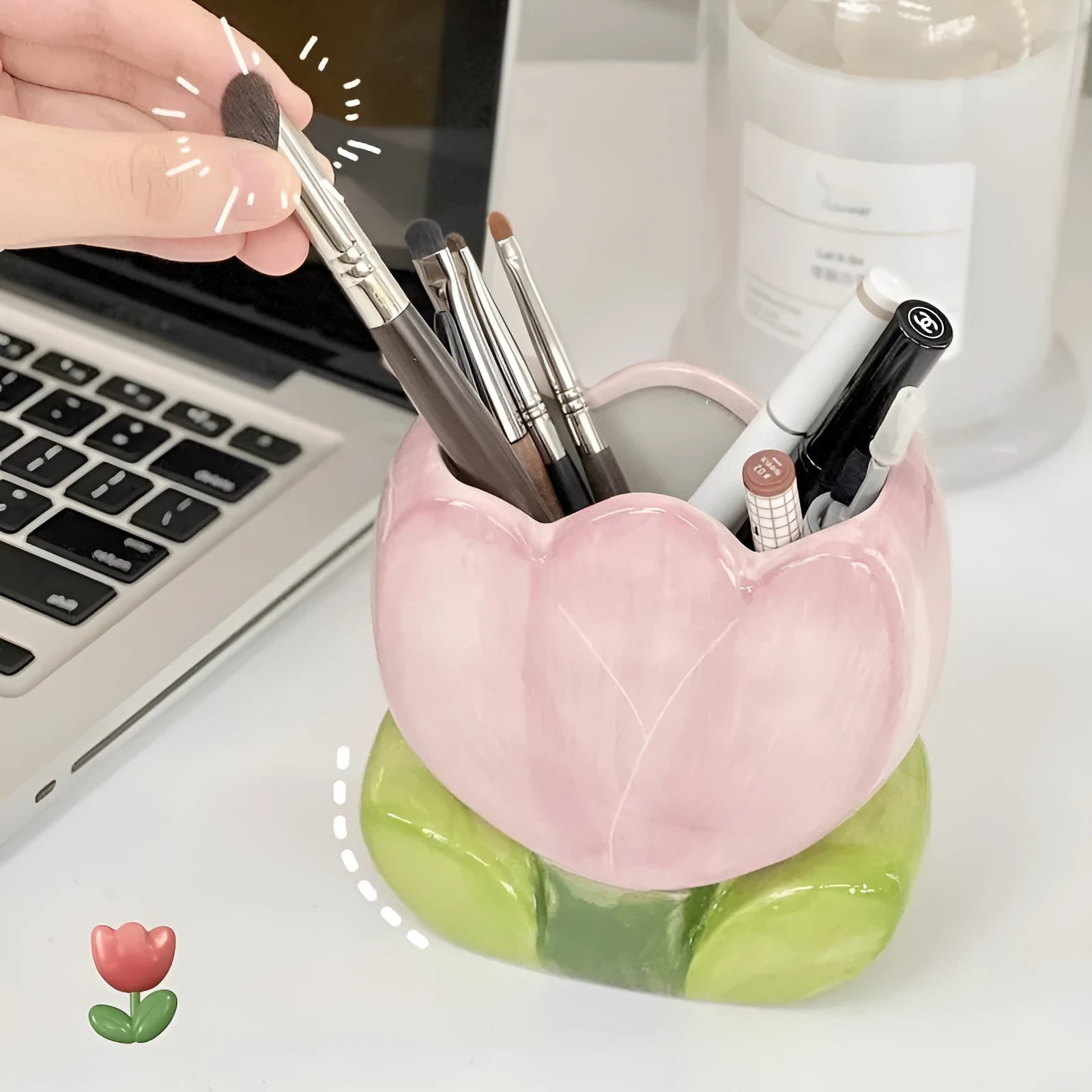 Ceramic pen holder box with floral pattern for desk organisation.