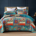 Quilted pure cotton bed cover and pillowcase set in a checked pattern on a double bed.