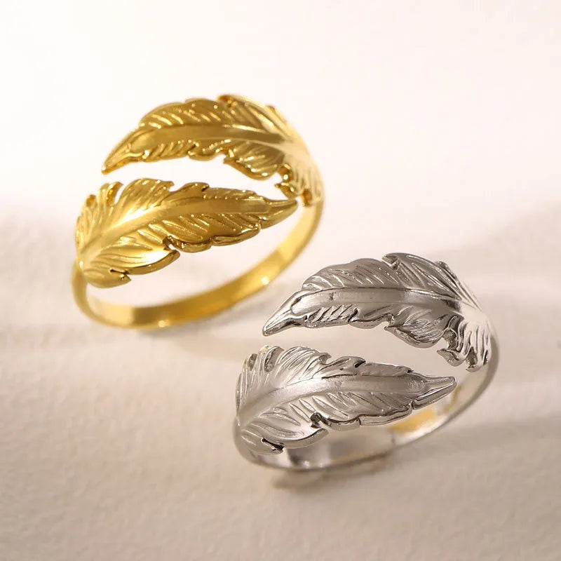 Women's stainless steel feather ring with adjustable opening in gold or silver finish
