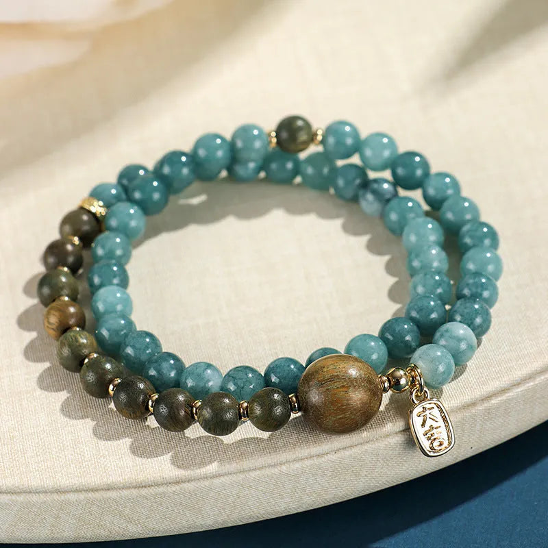 Blue New Chinese style beaded bracelet for women with Fu and Xi characters.